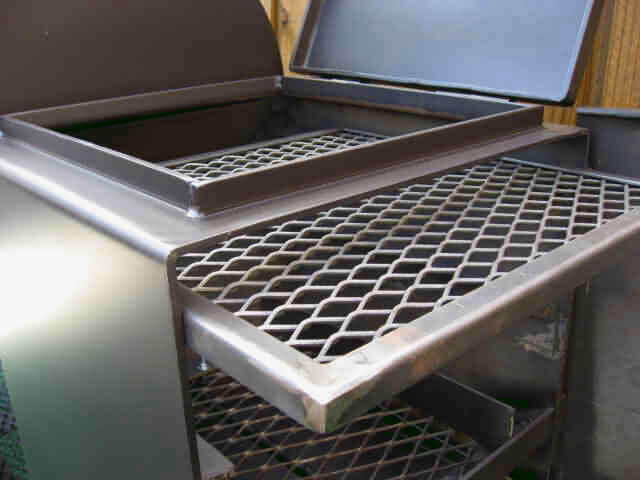 slide out direct grill grate in firebox of model 2040CC